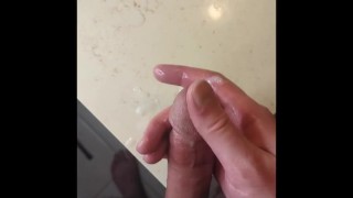 Bi guy inserts butt plug and cums on counter