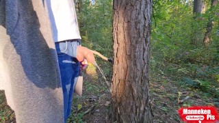 On a walk in the forest, long pissing under a tree