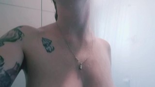 Natural blonde shows off armpits in shower