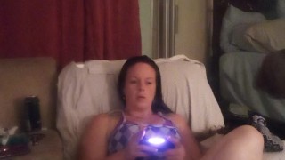 Sexy long hair brunette bbw eating pizza and smoking cigarettes while playing video games