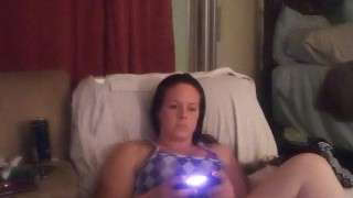 Sexy long hair brunette bbw eating pizza and smoking cigarettes while playing video games