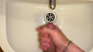 Jerking off and cumming into my hand in the dorm room