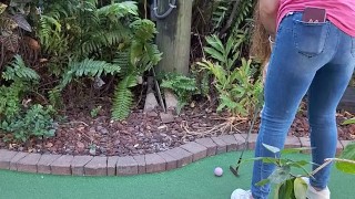 Pretty girl golfing in tight ripped jeans sfw