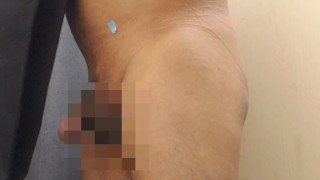 in the store dressing room trying on some pants