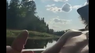 Jerking off while kayaking on the river