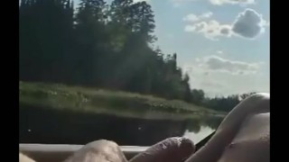 Jerking off while kayaking on the river