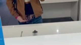 Showing off my chastity cage at the airport