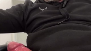 Trying to roll a condom on my thick cock.