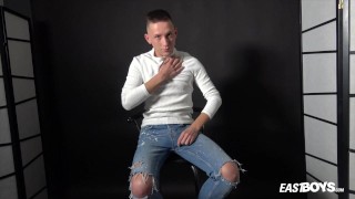 Solo boy jerking his curvy teen cock on the chair