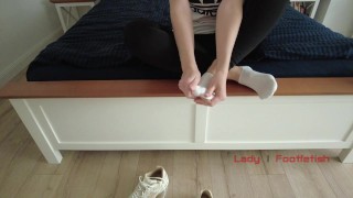 Give me a foot massage: my feet are tired and I'm putting on some cream