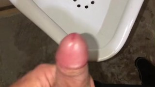 Risky public washroom urinal masturbation and cumshot