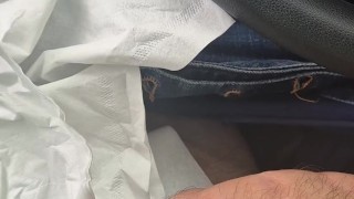 Guy jerking in car on the road