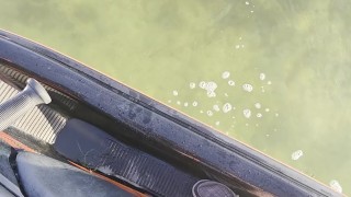Peeing off the side of a jet ski into the water 💦🍆 pissing outdoors