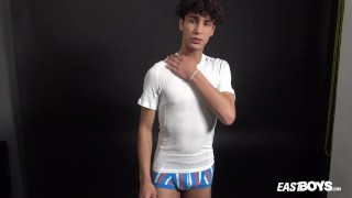 Curly twink boy shows off his slim body on webcam