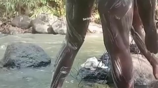 Stroking big black dick while shower outdoors part1