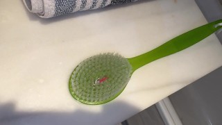 unaware giant shower brush trap