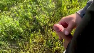 jerking off in the field, lots of cum