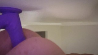 Round ass takes anal toy