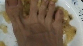 Mash the banana with my foot... Eat it, slave!