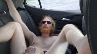 Sweaty ginger in car is too hot for his clothes and jacks off naked